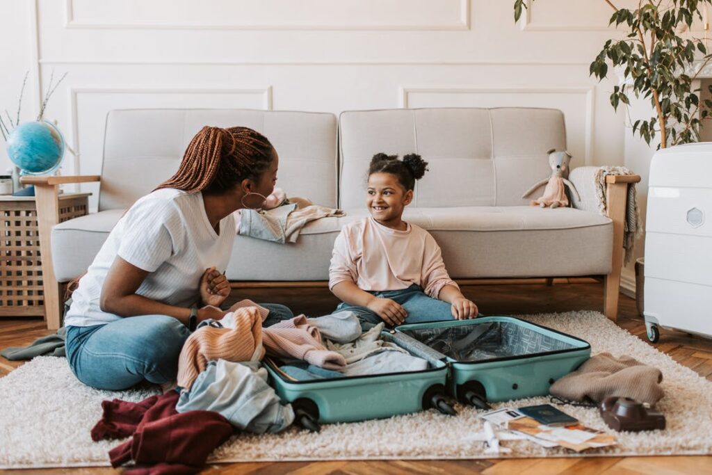 Mother and daughter packing and bonding